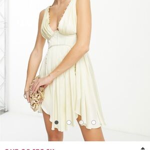 ASOS  corset plunge pleated satin mini dress with button detail in ivory